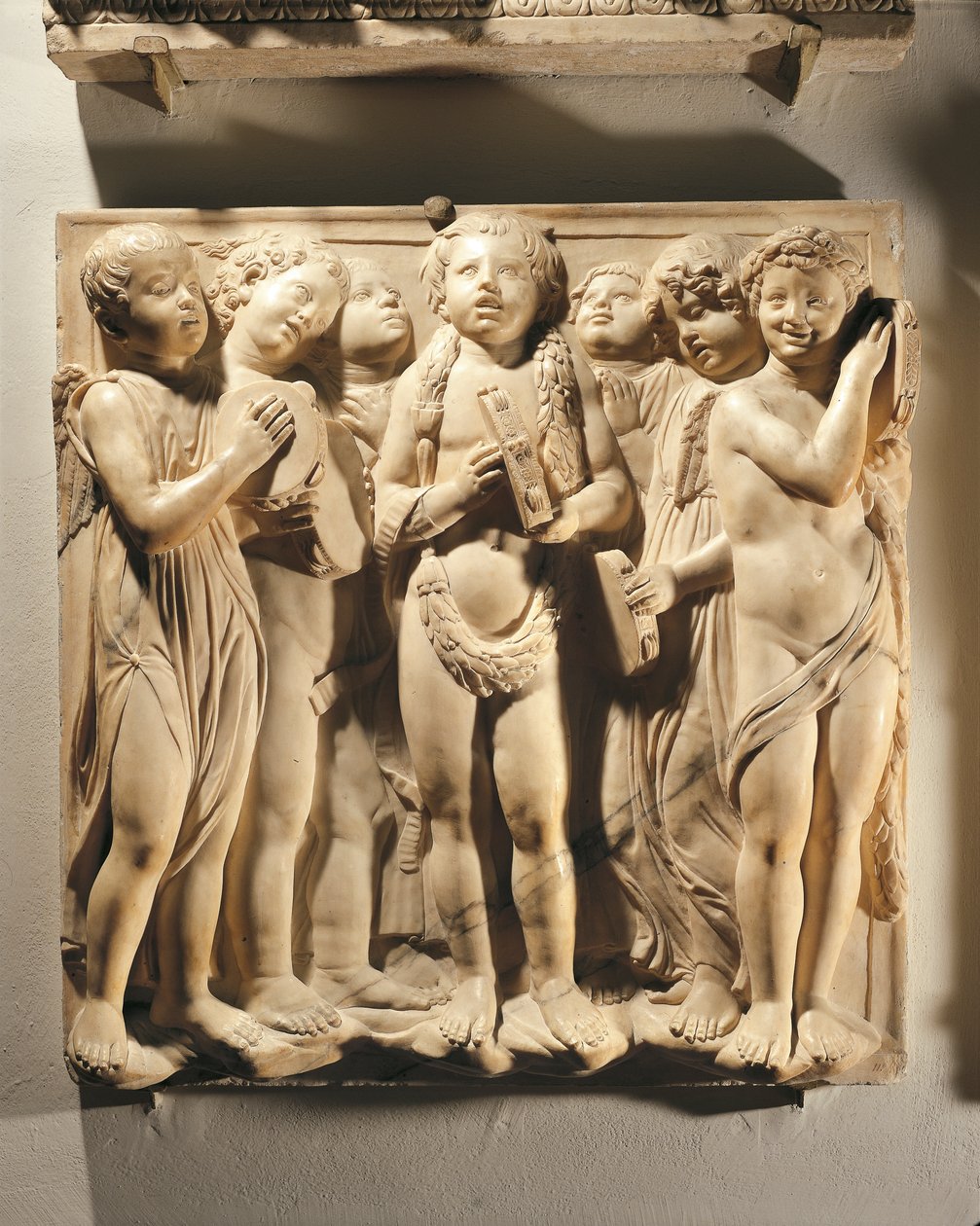 Lov ham med klingende bækkener (Salme 150, Lov Herren), panel med putti og engle, der spiller på bækkener af Luca Della Robbia
