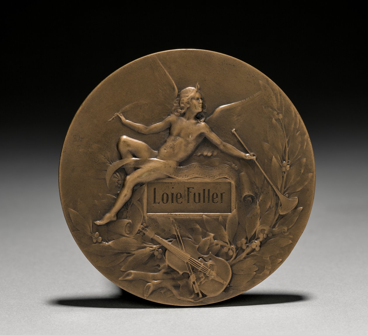 Medalje overrakt til Loïe Fuller af den franske regering: Allegory of Music (omvendt) af Marie Alexandre Lucien Coudray