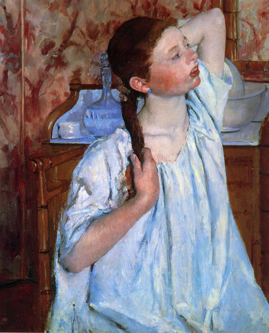Pige, der arrangerer sit hår af Mary Cassatt