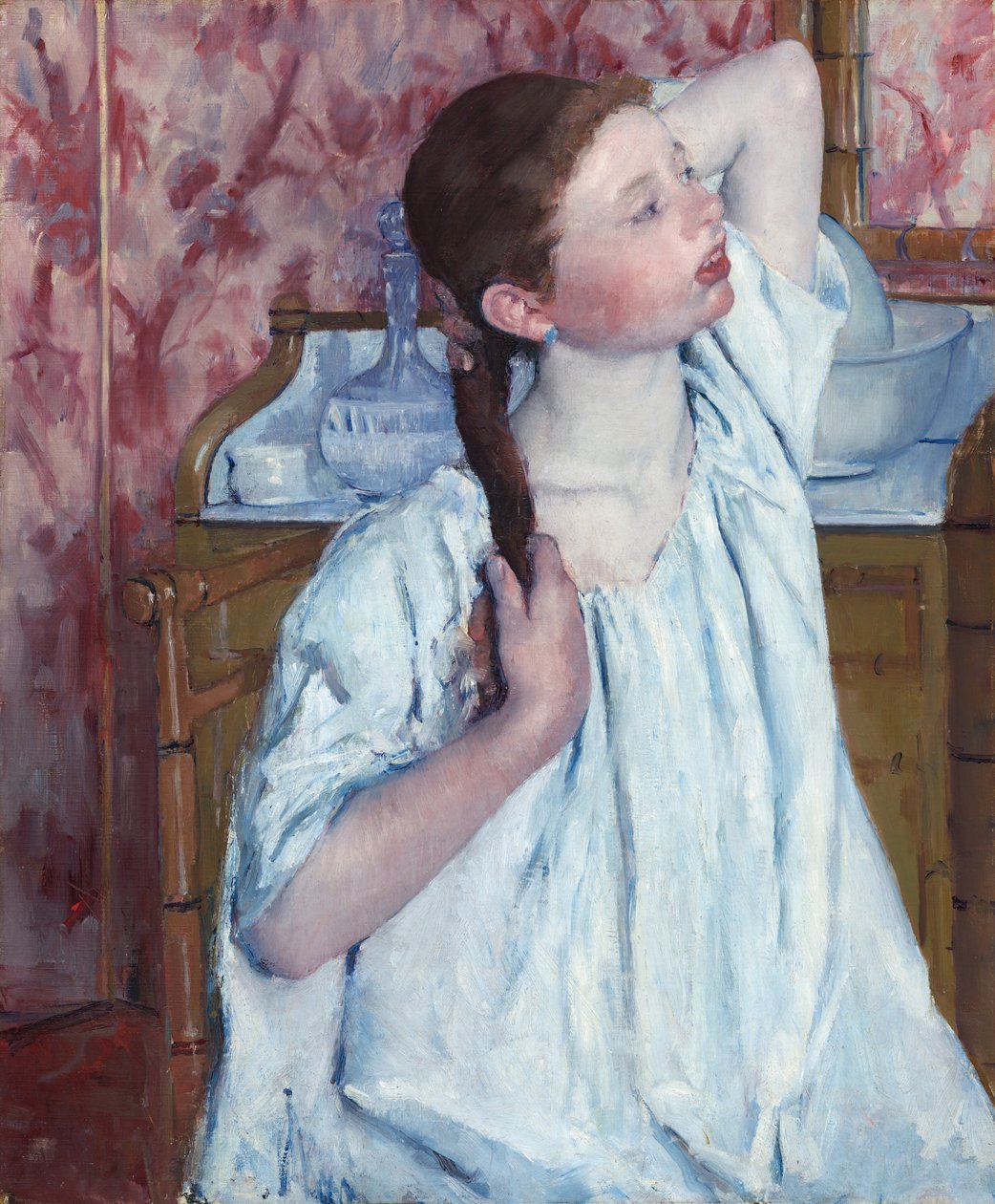 Pige arrangerer sit hår, 1886. af Mary Cassatt