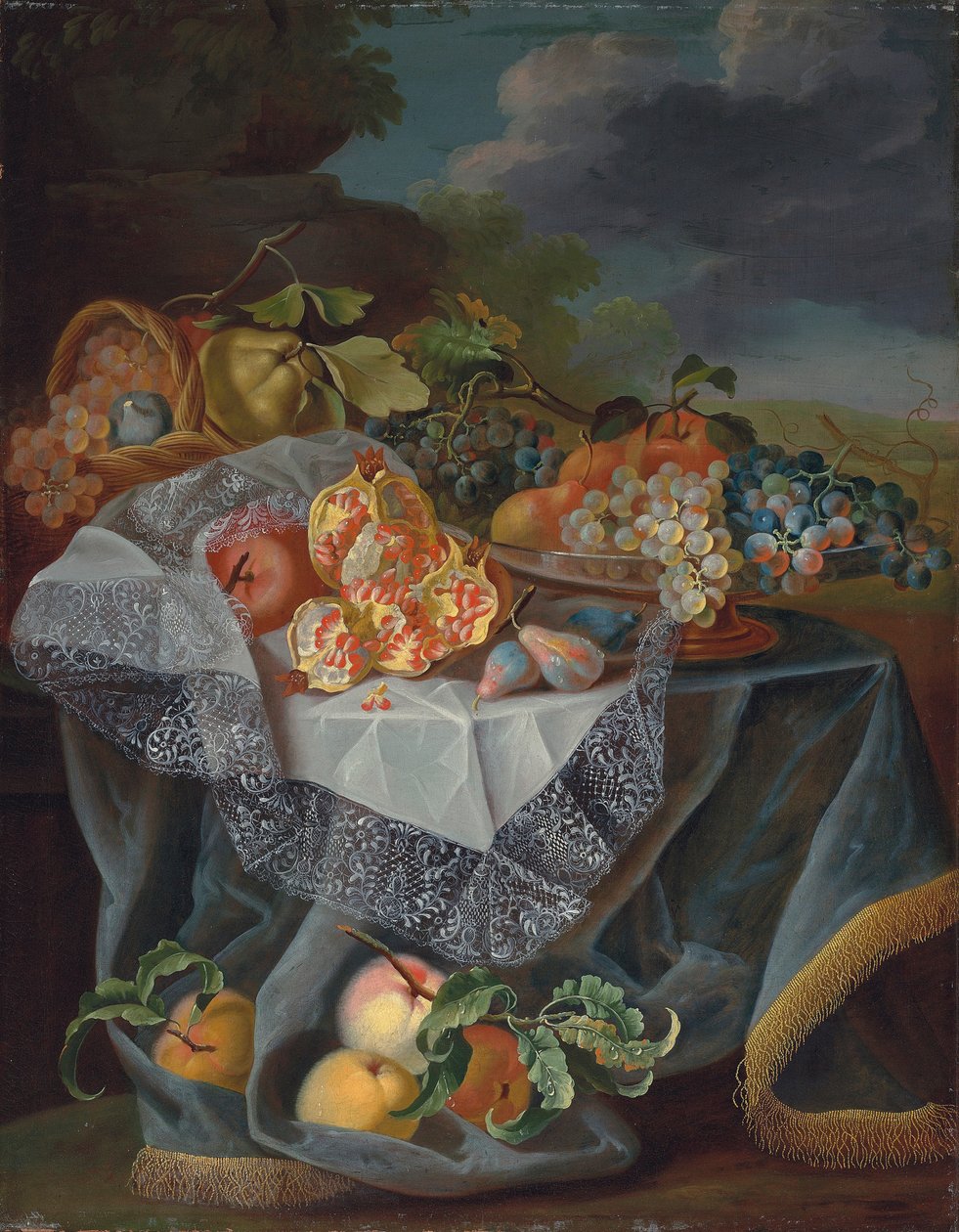 Druer, pærer og et æble på et glaskar, granatæbler og en vævet kurv med frugt på et draperet bord og et parklandskab bagved af Maximilian Pfeiler or Pfeiller