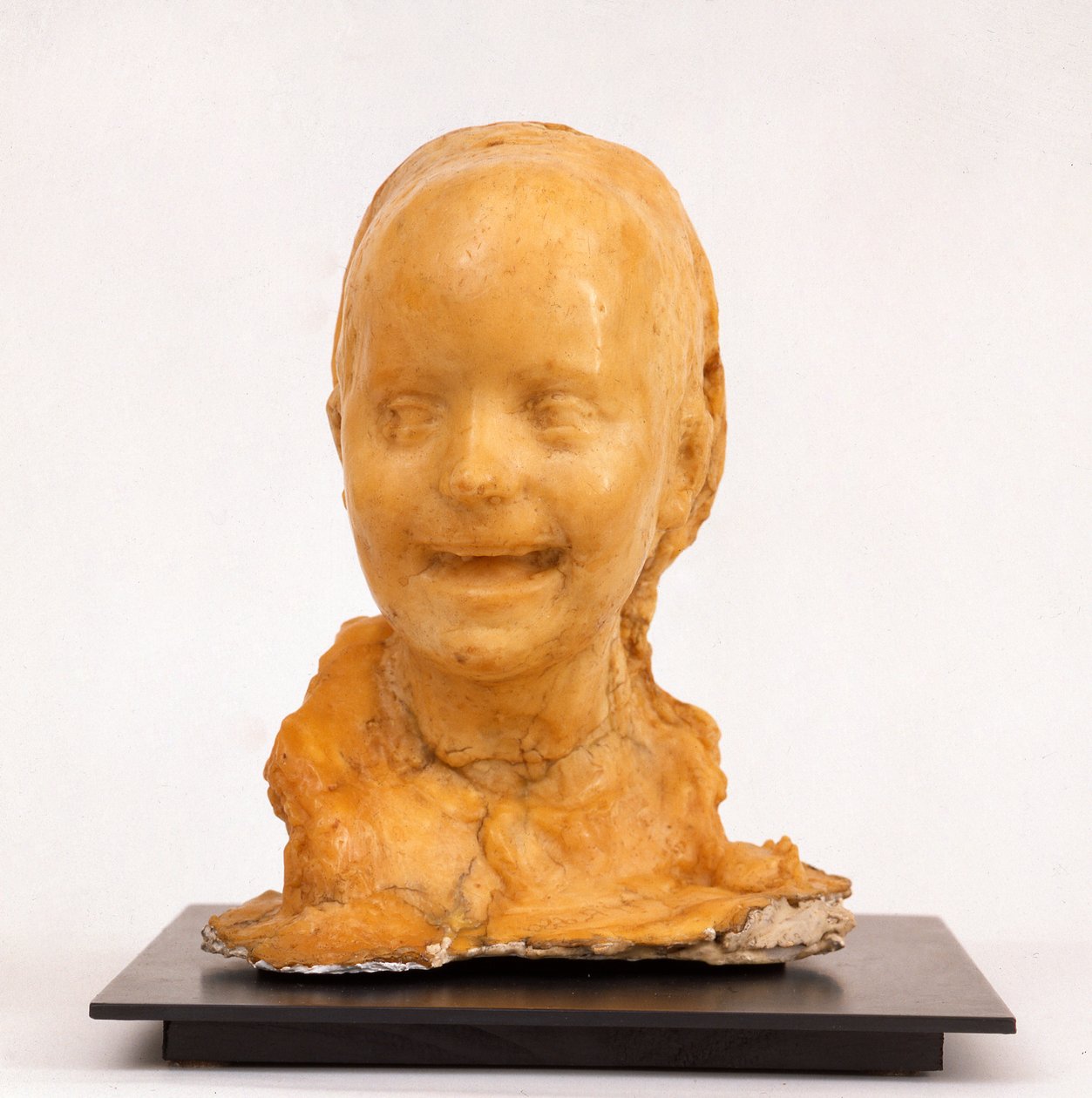 Den lille griner af Medardo Rosso