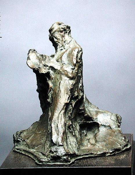Mand læser (effekt af en mand, der læser en avis) af Medardo Rosso