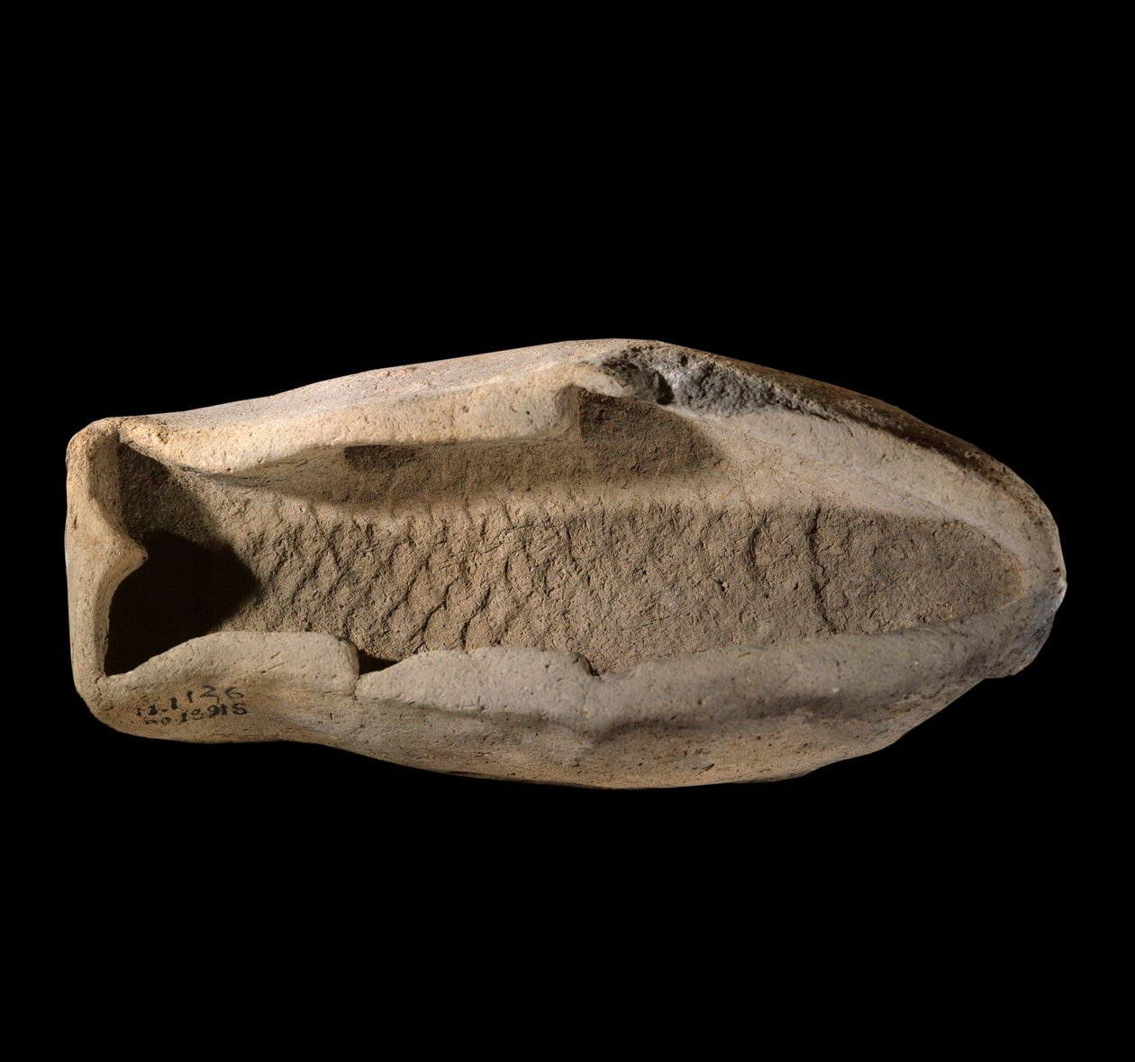 Mesopotamien: terracottaskimmel i form af fisk. Omkring 1800 f.Kr. Fra kongelige retter fra Kong Zimri Lims palads i Mari. Paris, Louvre-museet af Mesopotamian