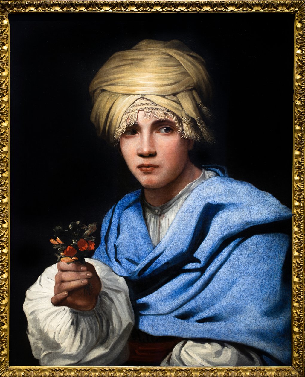 Dreng med turban holder en buket blomster af Michael Sweerts