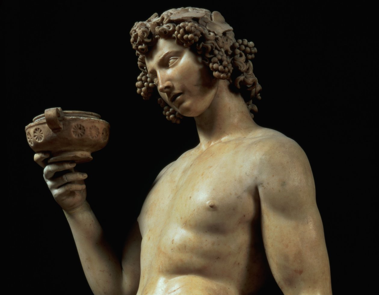 The Drunkenness of Bacchus, detalje af hans hoved, skulptur af Michelangelo Buonarroti 1475-1564, 1496-97 marmordetalje af 52672 af Michelangelo Buonarroti