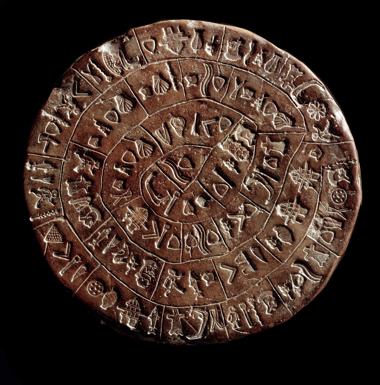 Skiven af Phaistos (Phaistos Disk, Phaestos Disc) (minoisk kunst - 1700 - 1600 f.Kr.) dækket med hieroglyffer. af Minoan