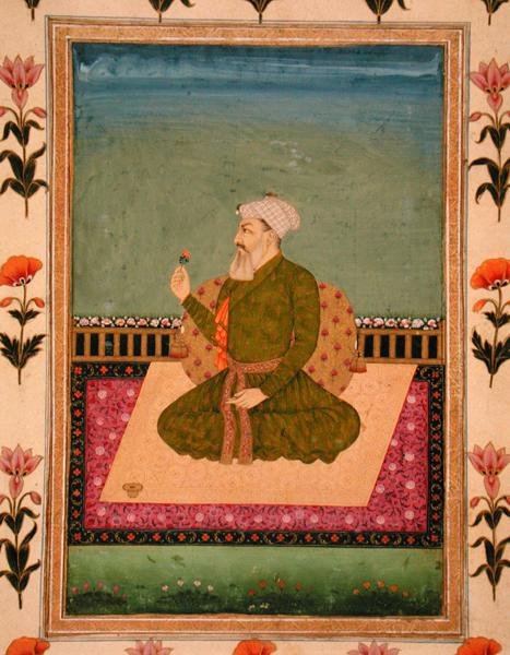 En lineal, der sidder på et tæppe eller en terrasse, holder en blomst, fra Small Clive Album (ugennemsigtig akvarel på papir) af Mughal School
