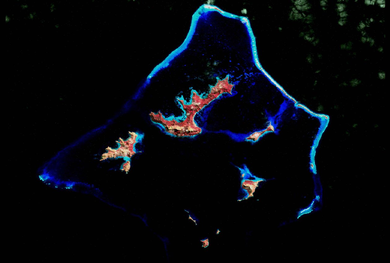 Koralrev fotograferet af NASAs Landsat 7-satellit. Kredit NASA. Videnskab Geologi Oceanografi af National Aeronautics and Space Administration National Aeronautics and Space Administration
