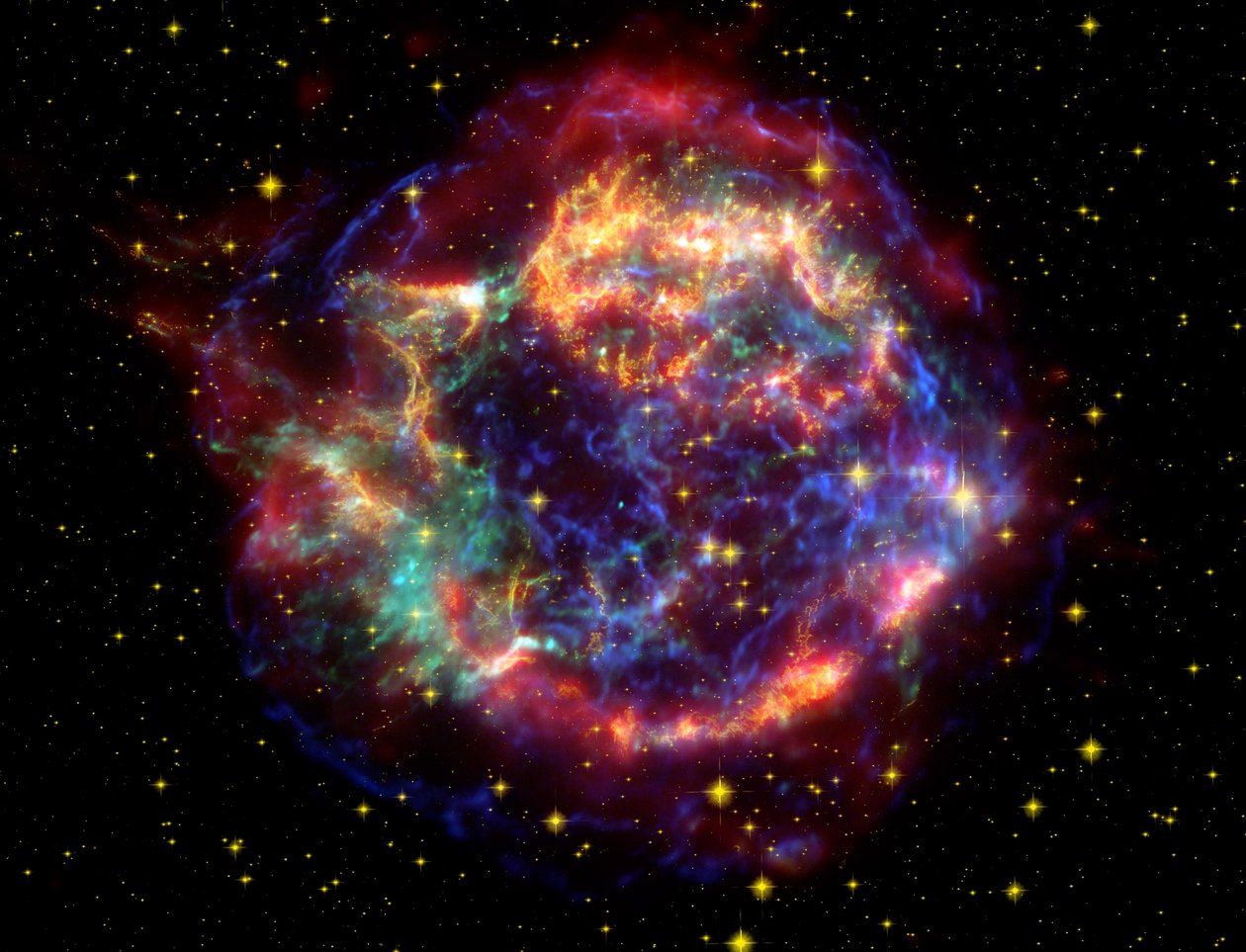 Falsk-farvebillede af supernova-rest Cassiopeia A i stjernebilledet Cassiopeia, 10.000 lysår væk. Det er en rest af en engang så massiv stjerne, der døde i en supernovaeksplosion. Kredit NASA. Sci af National Aeronautics and Space Administration National Aeronautics and Space Administration