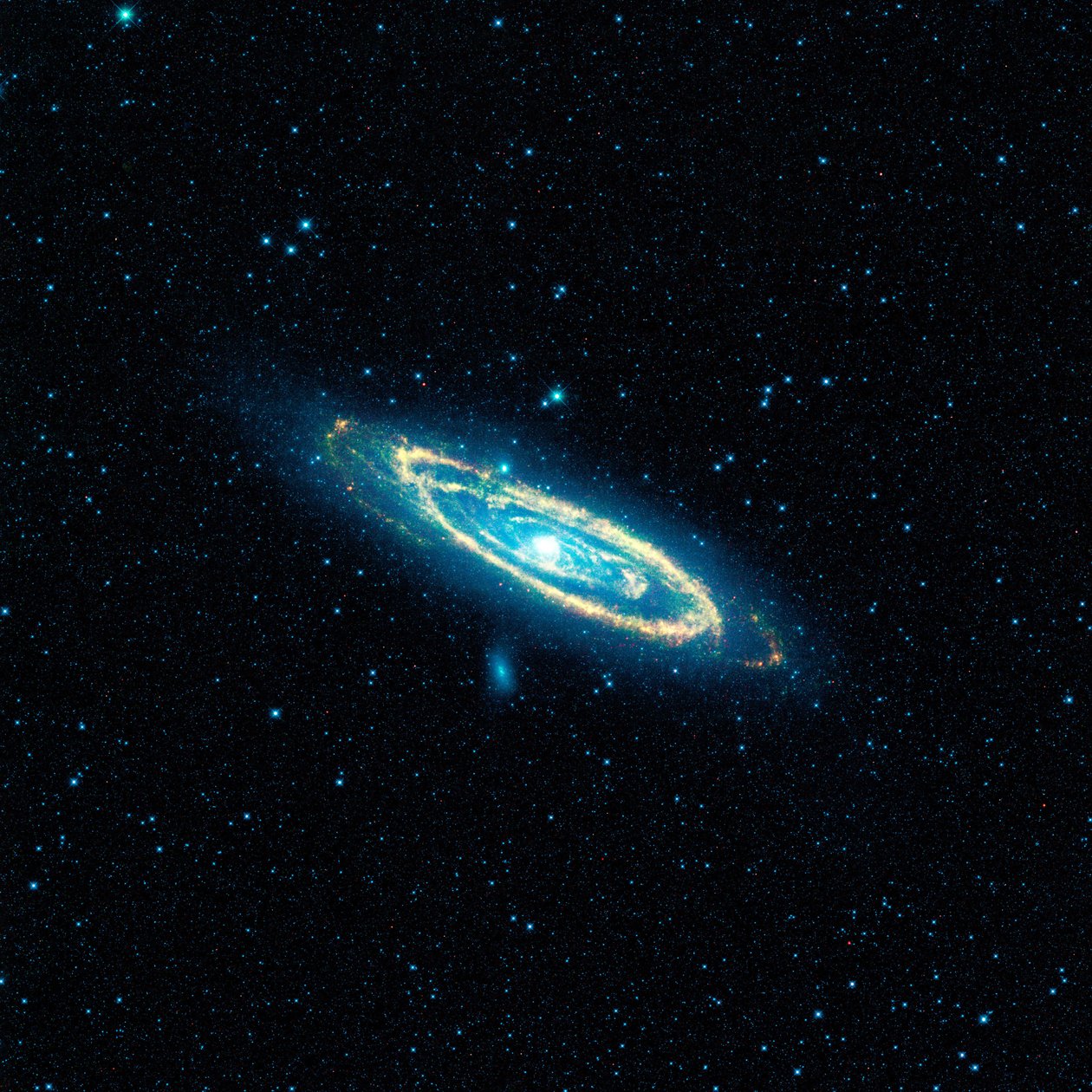 Billede af Andromeda-galaksen, M31, taget af NASAs Wide-field Infrared Survey Explorer (WISE). Mosaikken dækker et område svarende til mere end 100 fuldmåner. Kredit NASA. Videnskab Astronomi af National Aeronautics and Space Administration National Aeronautics and Space Administration
