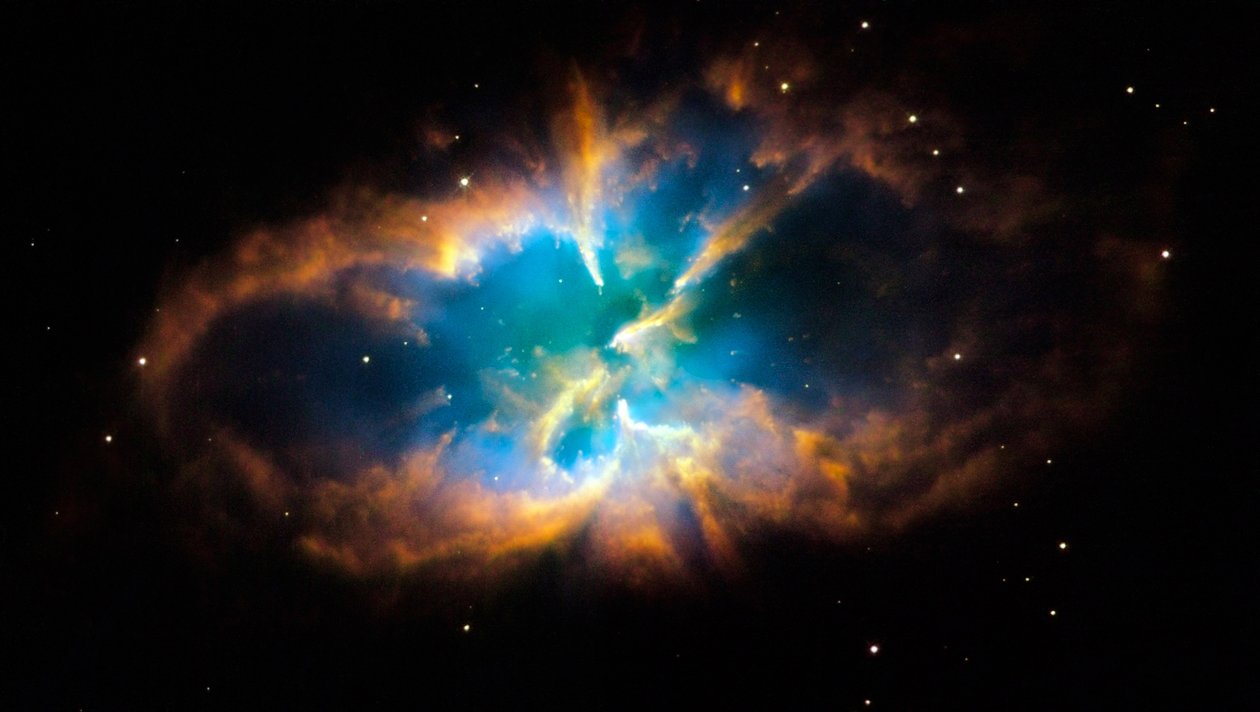 Planetarisk tåge NGC 2818 i den sydlige konstellation Pyxis (Kompasset). Glødende lag og skal af gas blev skabt, da en stjerne kastede sine ydre lag ud i rummet efter at være løbet tør for kernekraft af National Aeronautics and Space Administration National Aeronautics and Space Administration