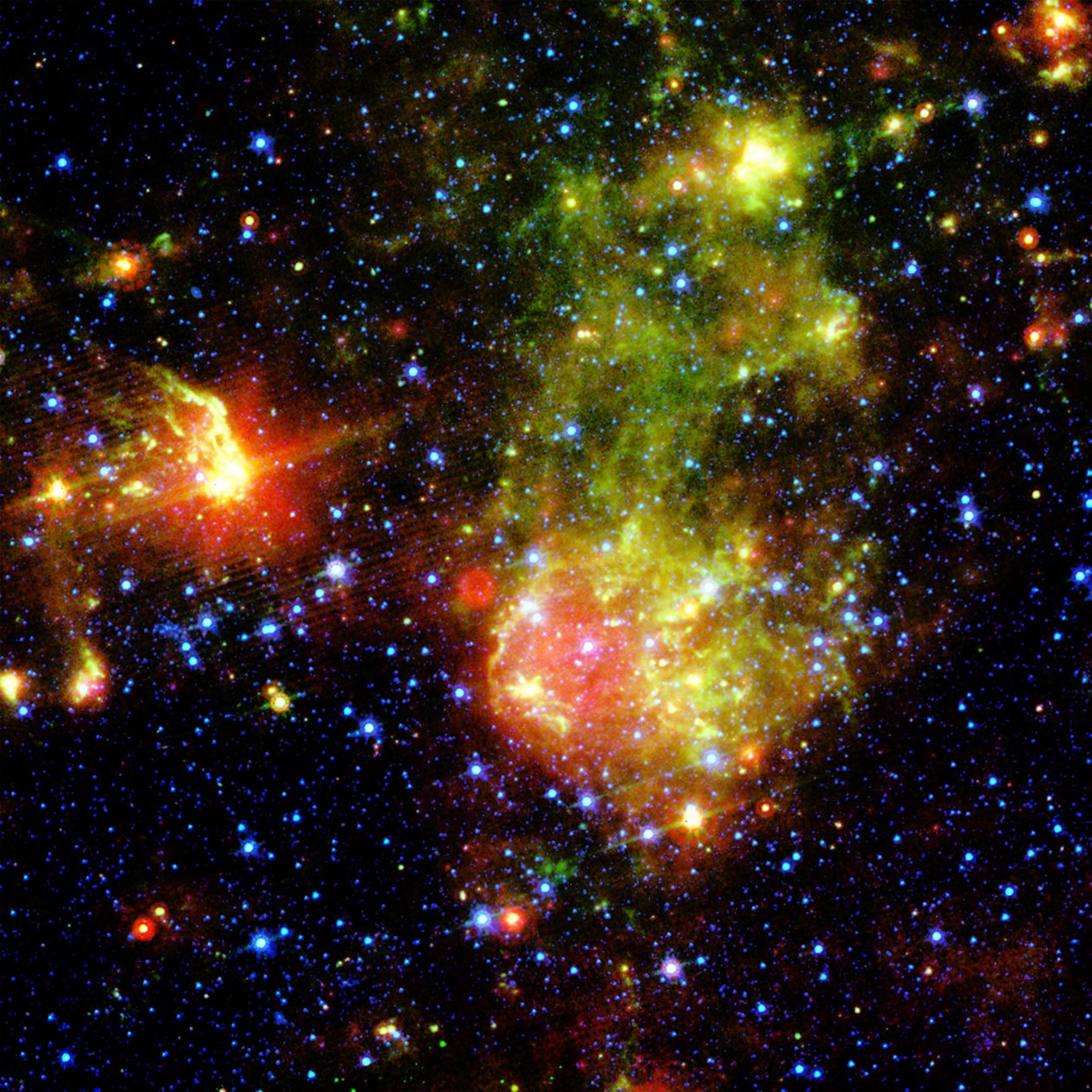 Supernova-rest 1E0102.2-7219 ved siden af Nebula N76 i et lyst, stjernedannende område af Den Lille Magellanske Sky, som ligger omkring 200.000 lysår fra Jorden. Kredit NASA. Videnskab Astronomi af National Aeronautics and Space Administration National Aeronautics and Space Administration