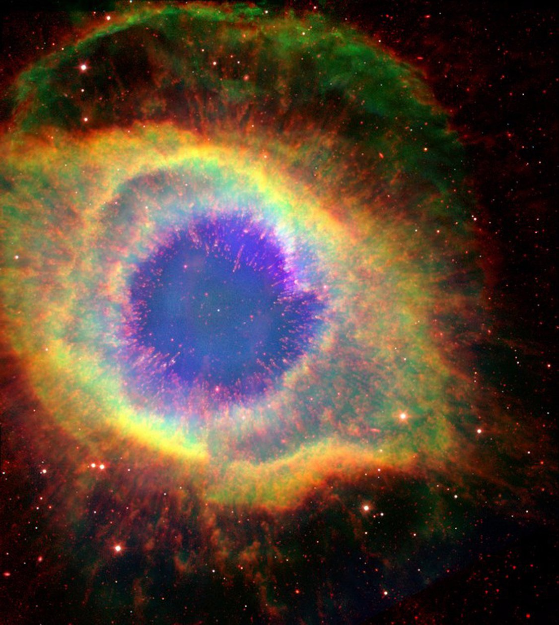 Helix-tågen (NGC 7293), nogle gange kaldet Guds øje, en stor planetarisk tåge i stjernebilledet Vandmanden. Kredit: NASA. af National Aeronautics and Space Administration National Aeronautics and Space Administration