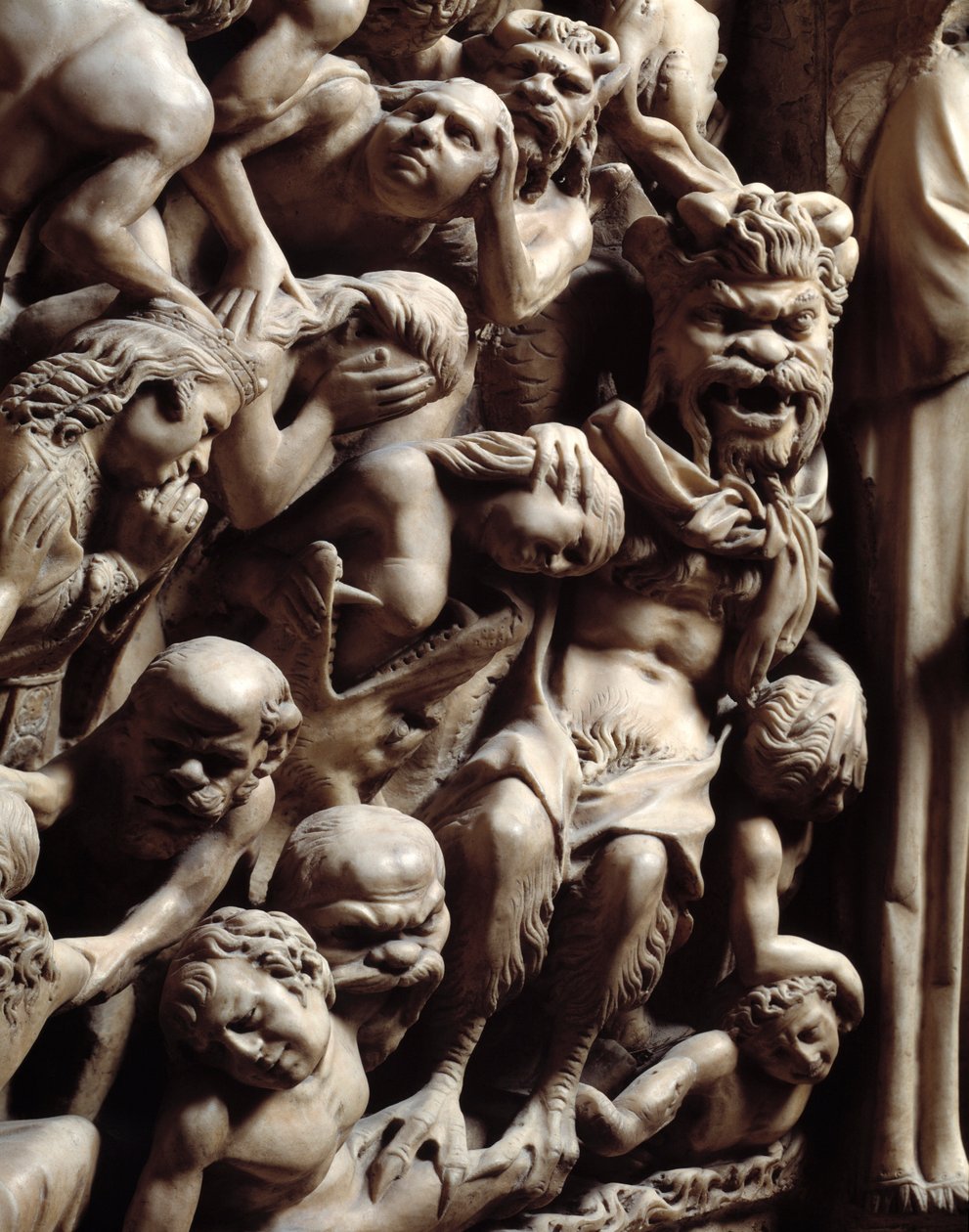 Gotisk kunst: detalje af relieffer, der repræsenterer helvede for helvede i den sidste dom, marmorprædikestol af Nicola Pisano af Nicola Pisano