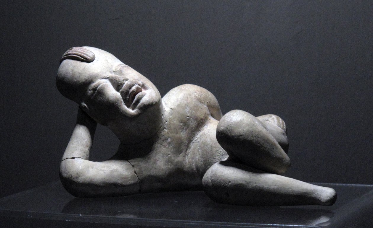 Liggende Olmec baby-ansigtsfigur, Villa Nueva af Olmec