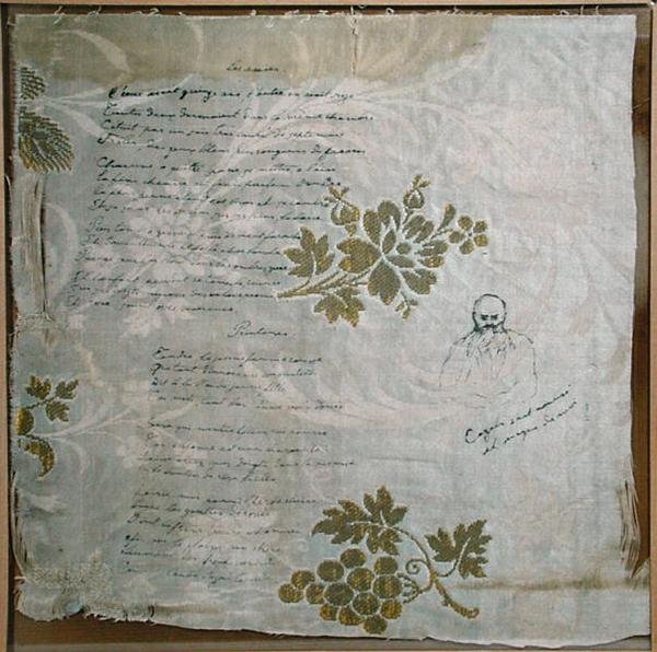 Et stykke dug, hvorpå Verlaine har skrevet sine digte "Les Amies" og "Le Printemps", med et portræt af Verlaine af Cazals (pen og blæk på stof) af Paul Verlaine