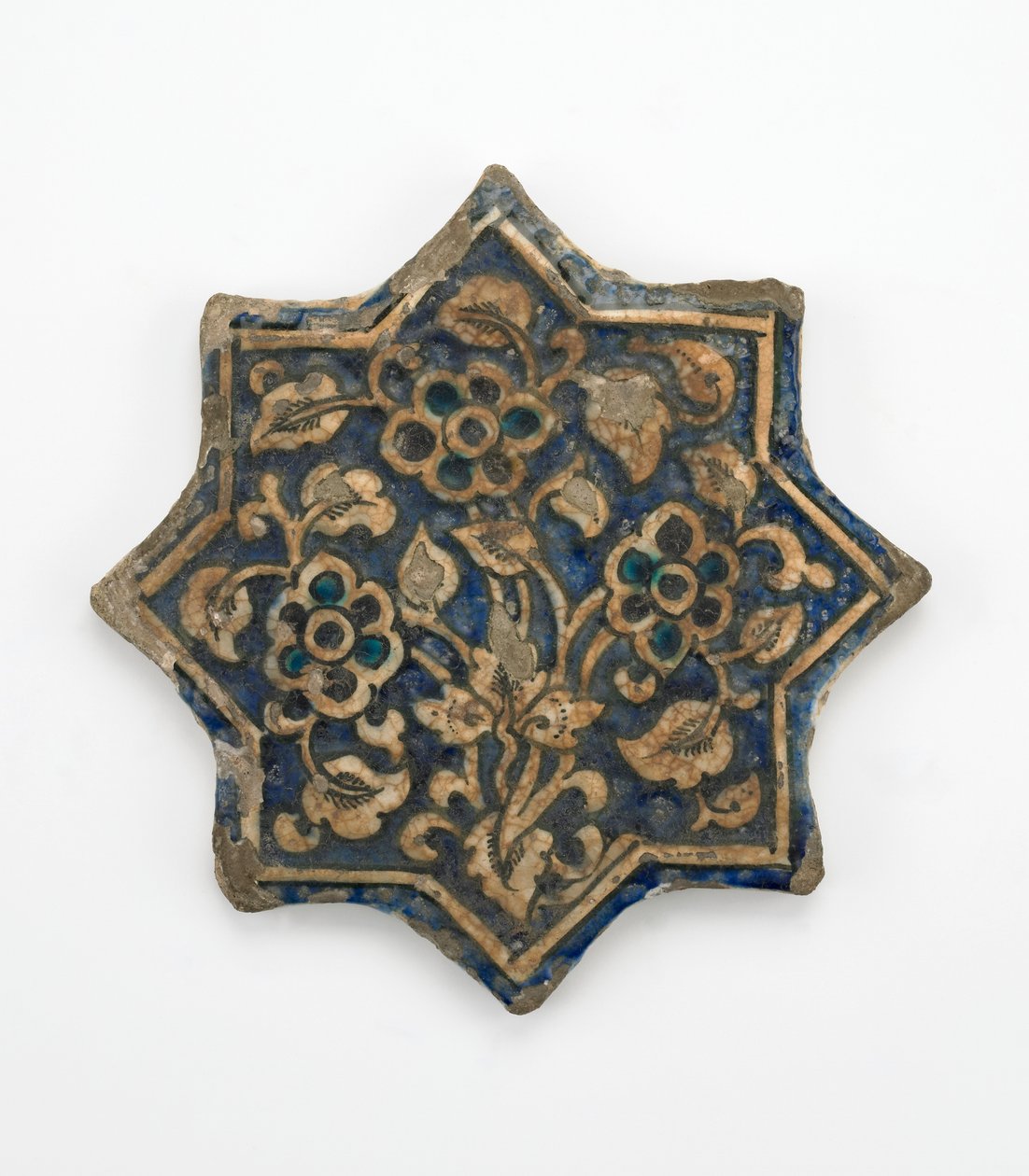 Flise i ottetakket stjerneform, Il-Khanid periode, 1256-1335 (stenpasta, støbt og malet under gennemsigtig glasur) af Persian School