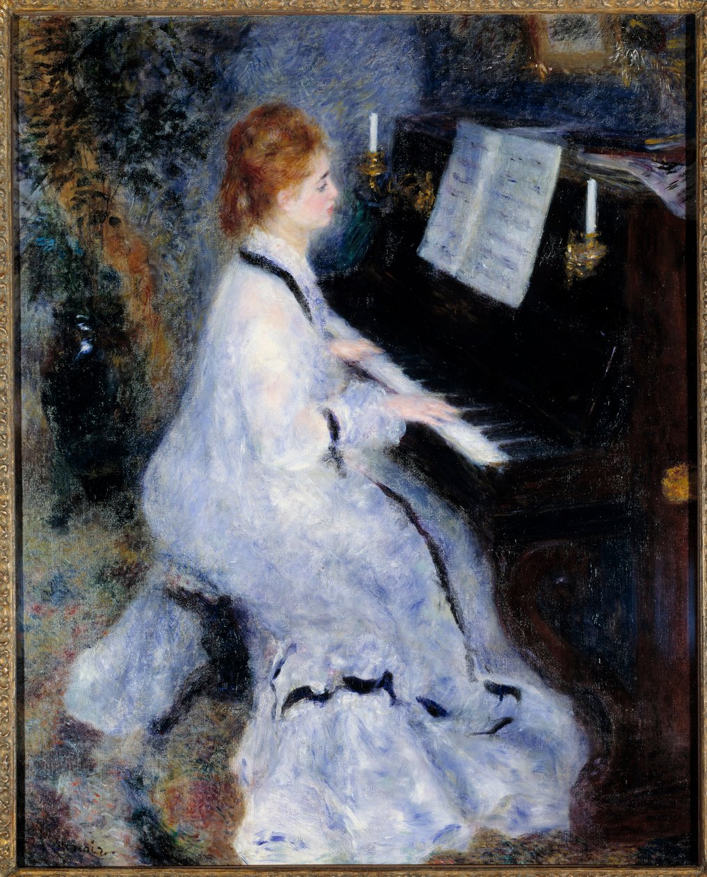 Ung kvinde ved klaveret af Pierre Auguste Renoir