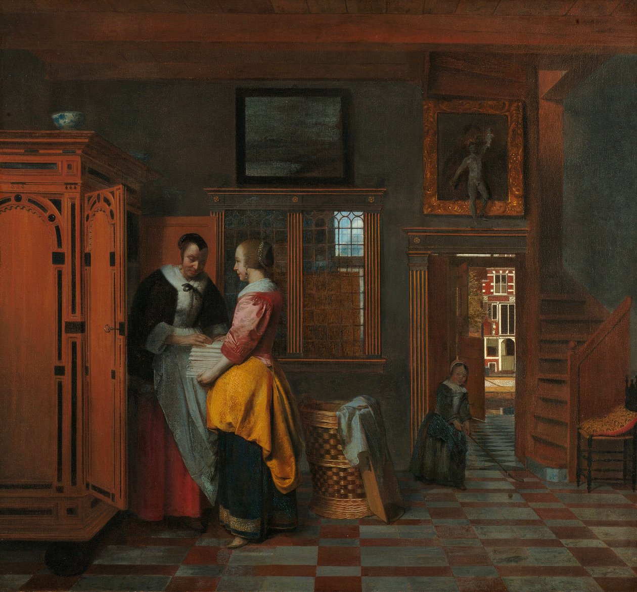 Interiør med kvinder ved siden af et linnedskab af Pieter de Hooch