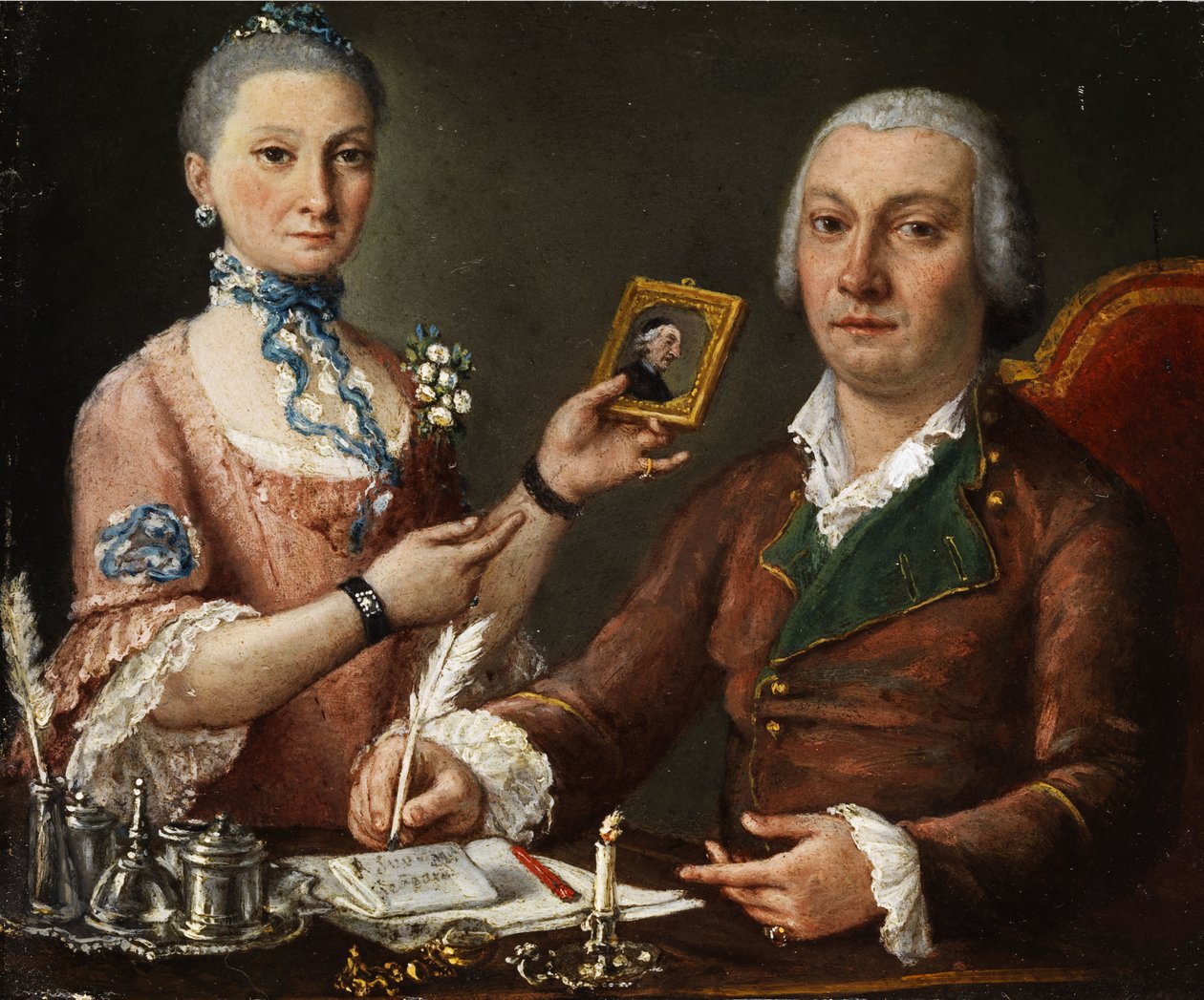 Par ved et bord med blækhus og stearinlys af Pietro Fabris