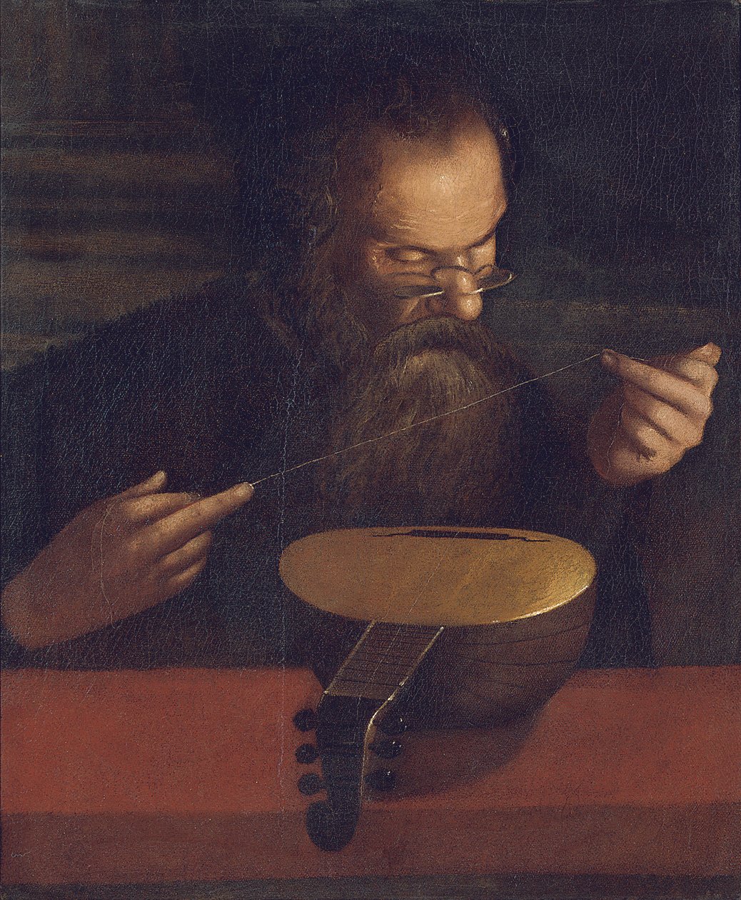 En gammel mand, der snor en lut (olie på lærred) af Pietro (circle of) Paolini