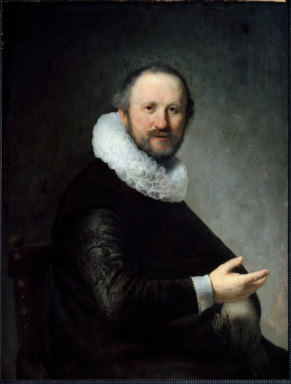 Hollandske borgerlige holder sine handsker iført ryg. (Maleri af Rembrandt van Rijn