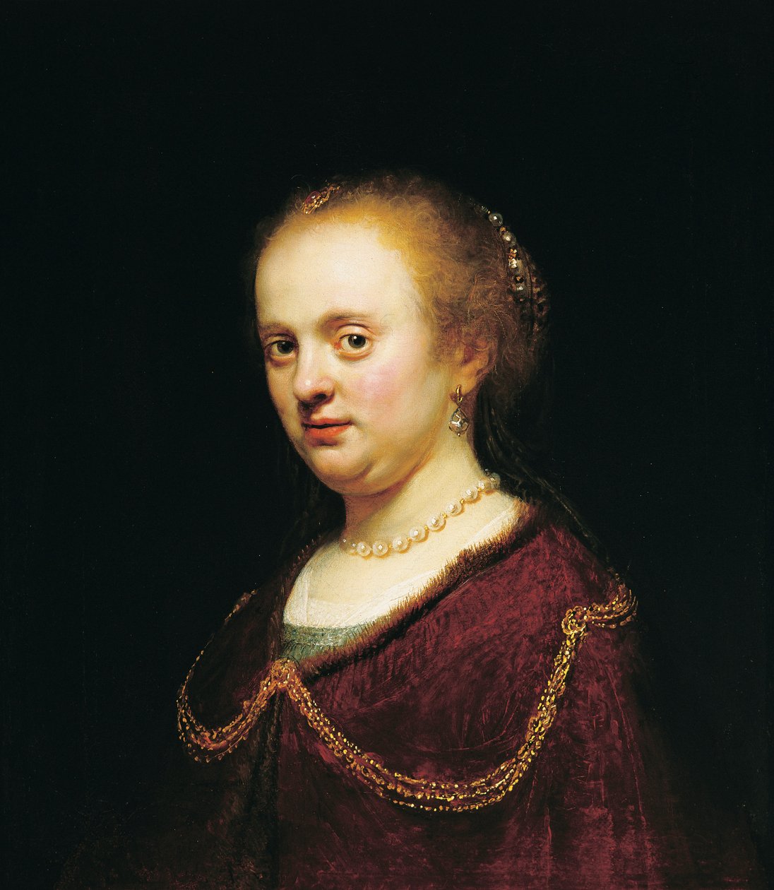Ung kvinde med en guldkæde af Rembrandt Harmensz. van Rijn