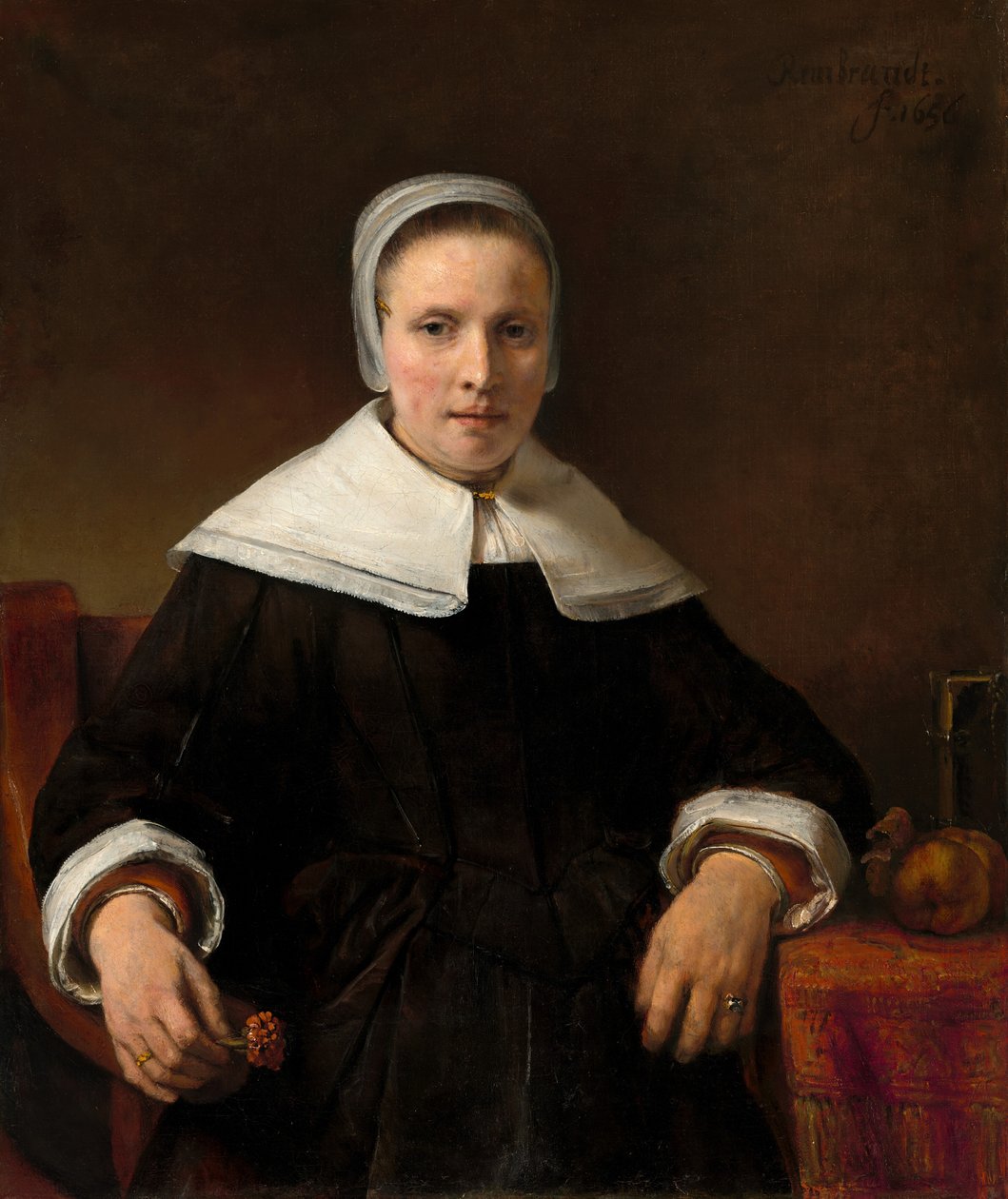 En kvinde, der holder en pink af Rembrandt van Rijn