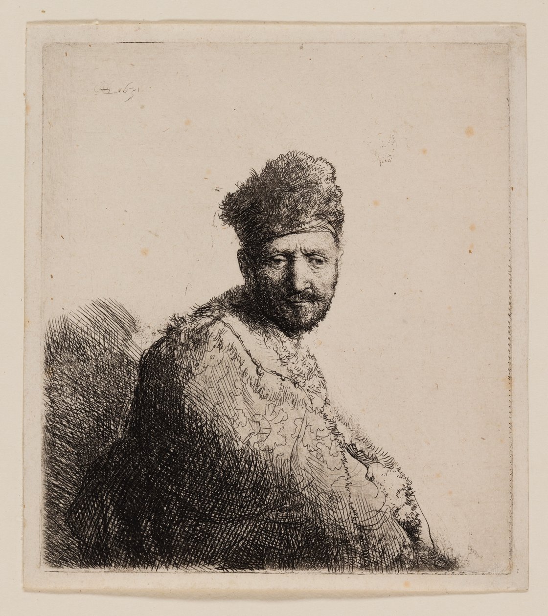 Skægget mand i pelset orientalsk kasket og kappe af Rembrandt van Rijn
