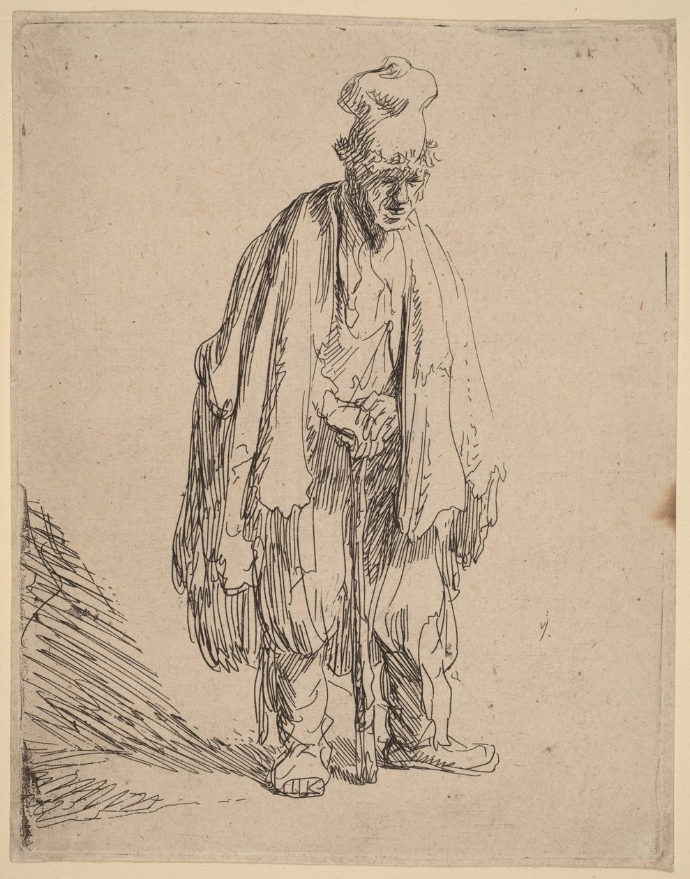 Tigger med høj kasket, stående og støttet til en stok af Rembrandt van Rijn