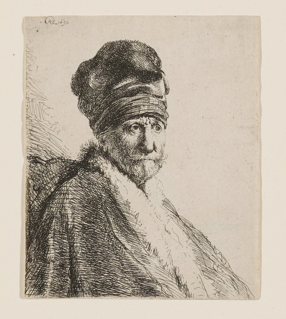 Buste af en mand med en høj kasket af Rembrandt van Rijn