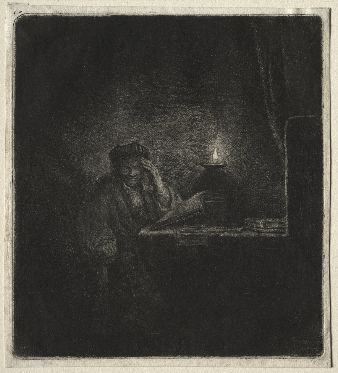 Kopi af Student ved et bord ved levende lys af Rembrandt van Rijn