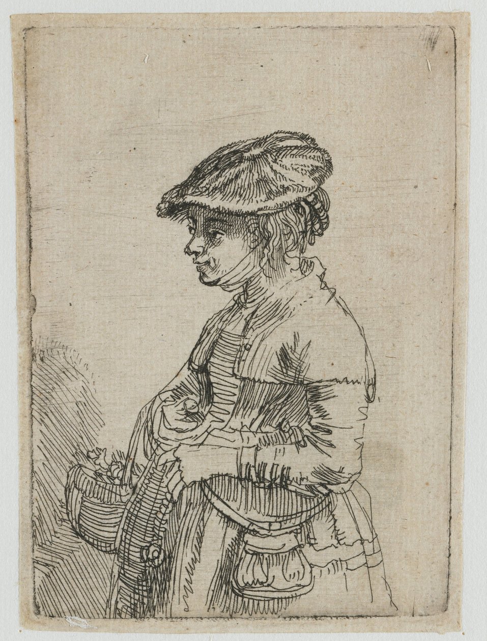 Pige med en kurv af Rembrandt van Rijn