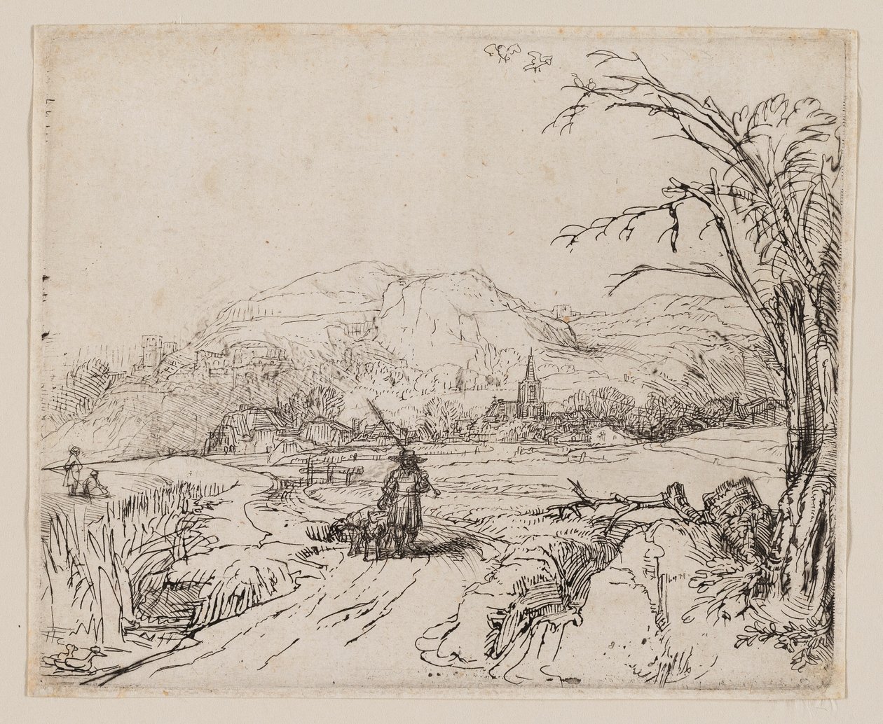 Landskab med sportsmand og hunde af Rembrandt van Rijn