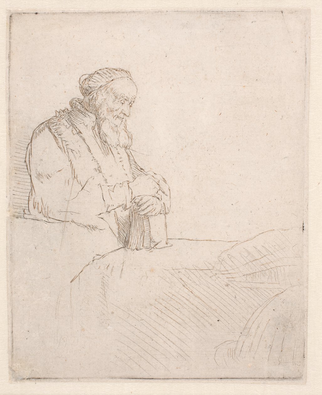 En ældre mand i meditation, der læner sig op ad en bog af Rembrandt van Rijn