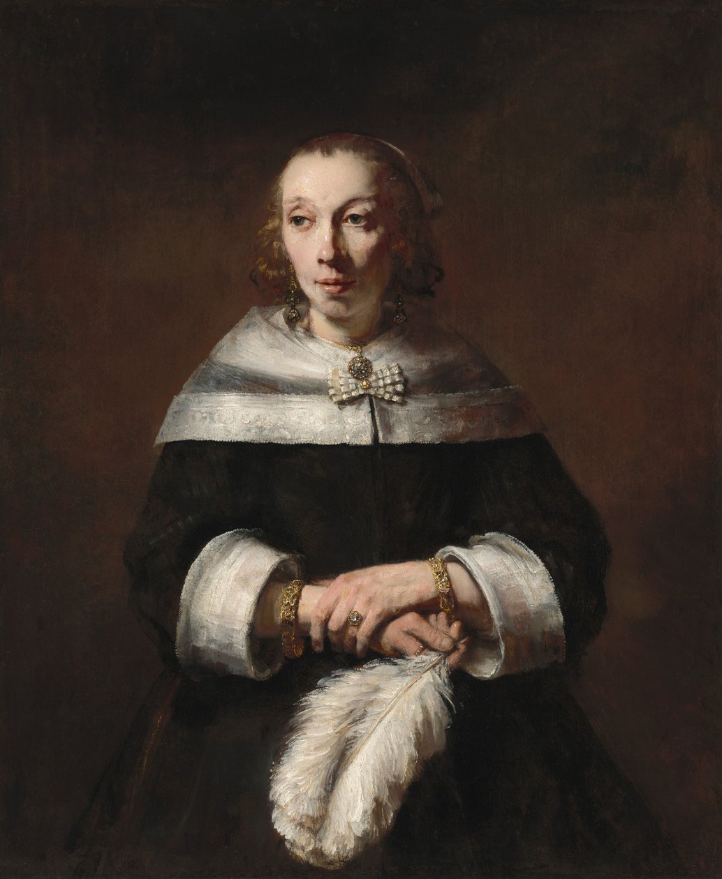 Portræt af en dame med en strudsfjervifte, ca. 16561658. af Rembrandt van Rijn