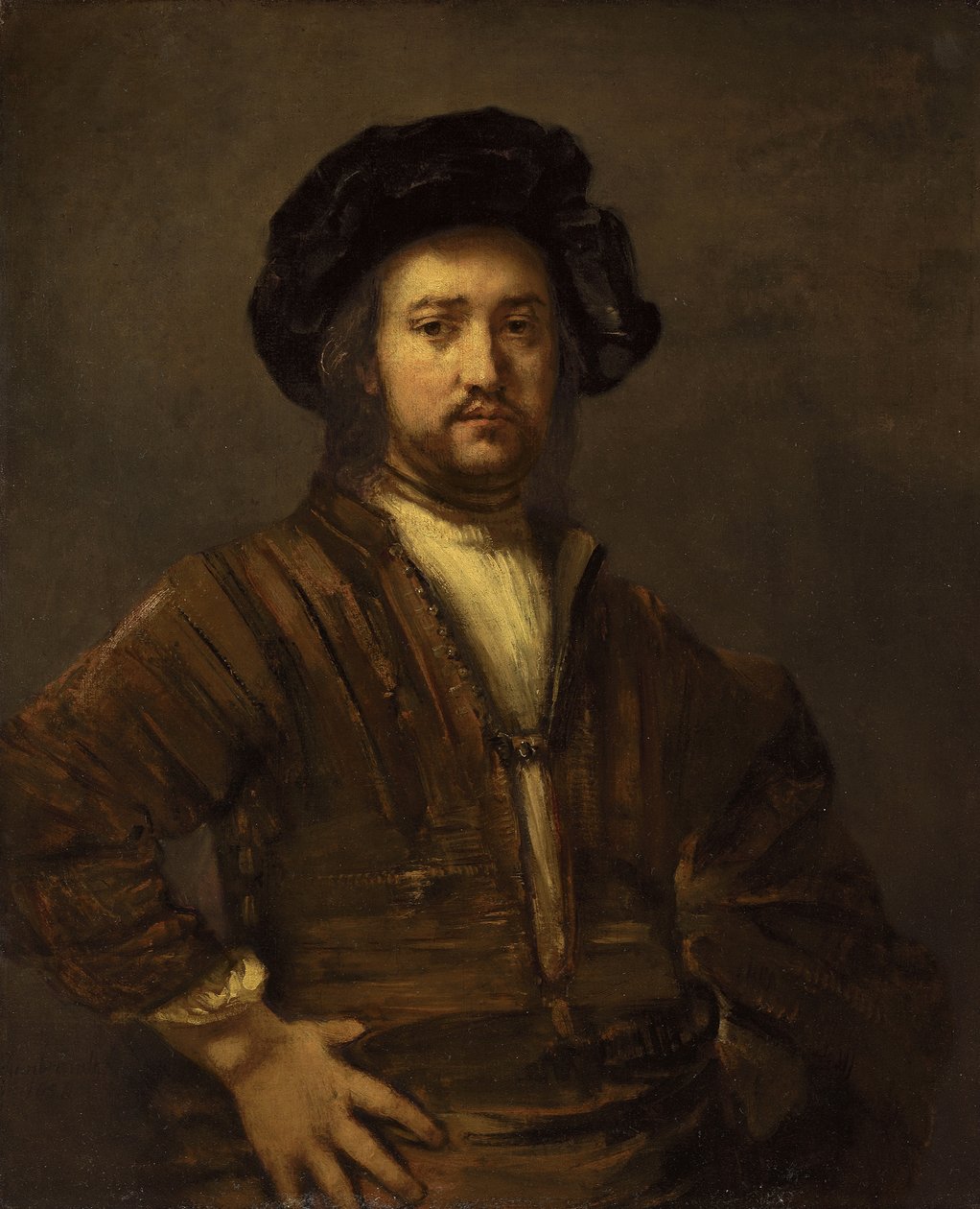 Portræt af en mand med arme akimbo af Rembrandt van Rijn