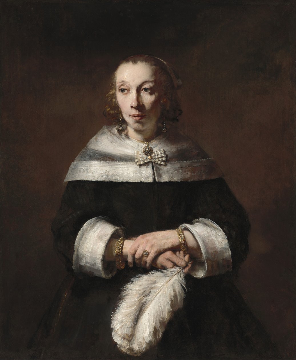 Portræt af en kvinde med en strudsfjervifte af Rembrandt van Rijn