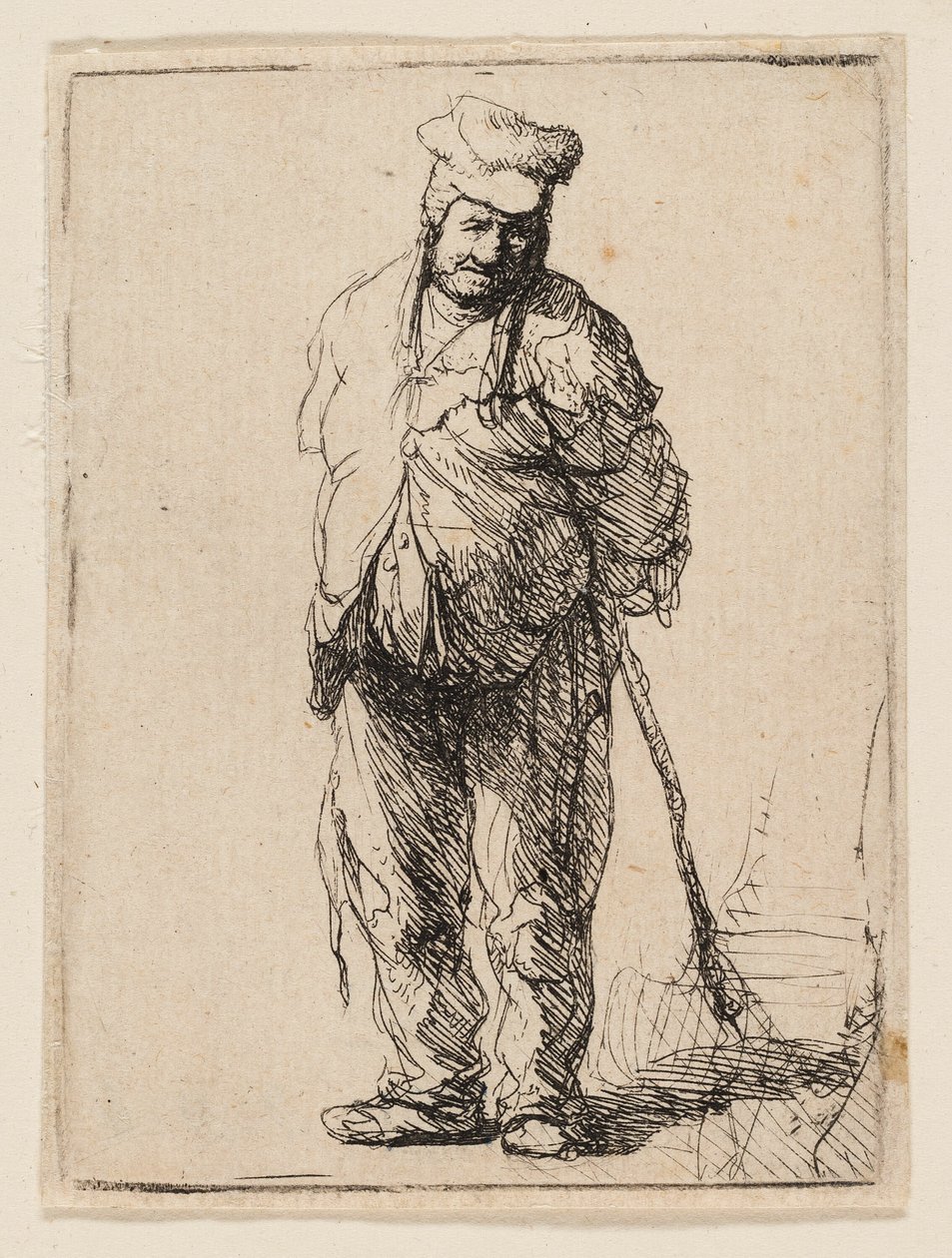 Raget bonde med hænderne bag sig, holder en pind af Rembrandt van Rijn