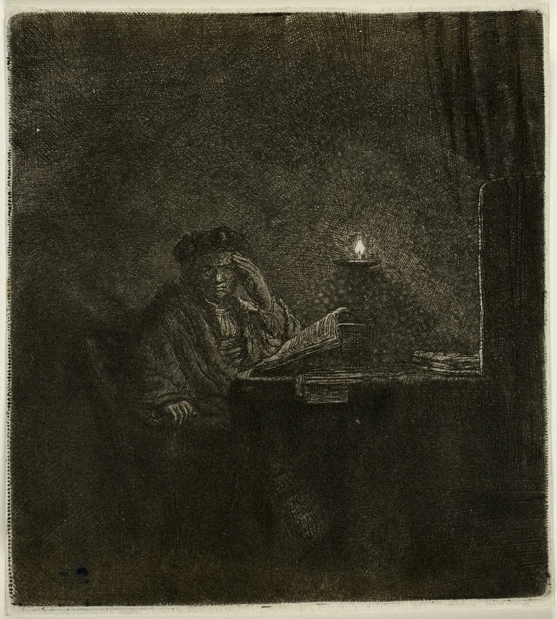 Student ved et bord ved levende lys af Rembrandt van Rijn