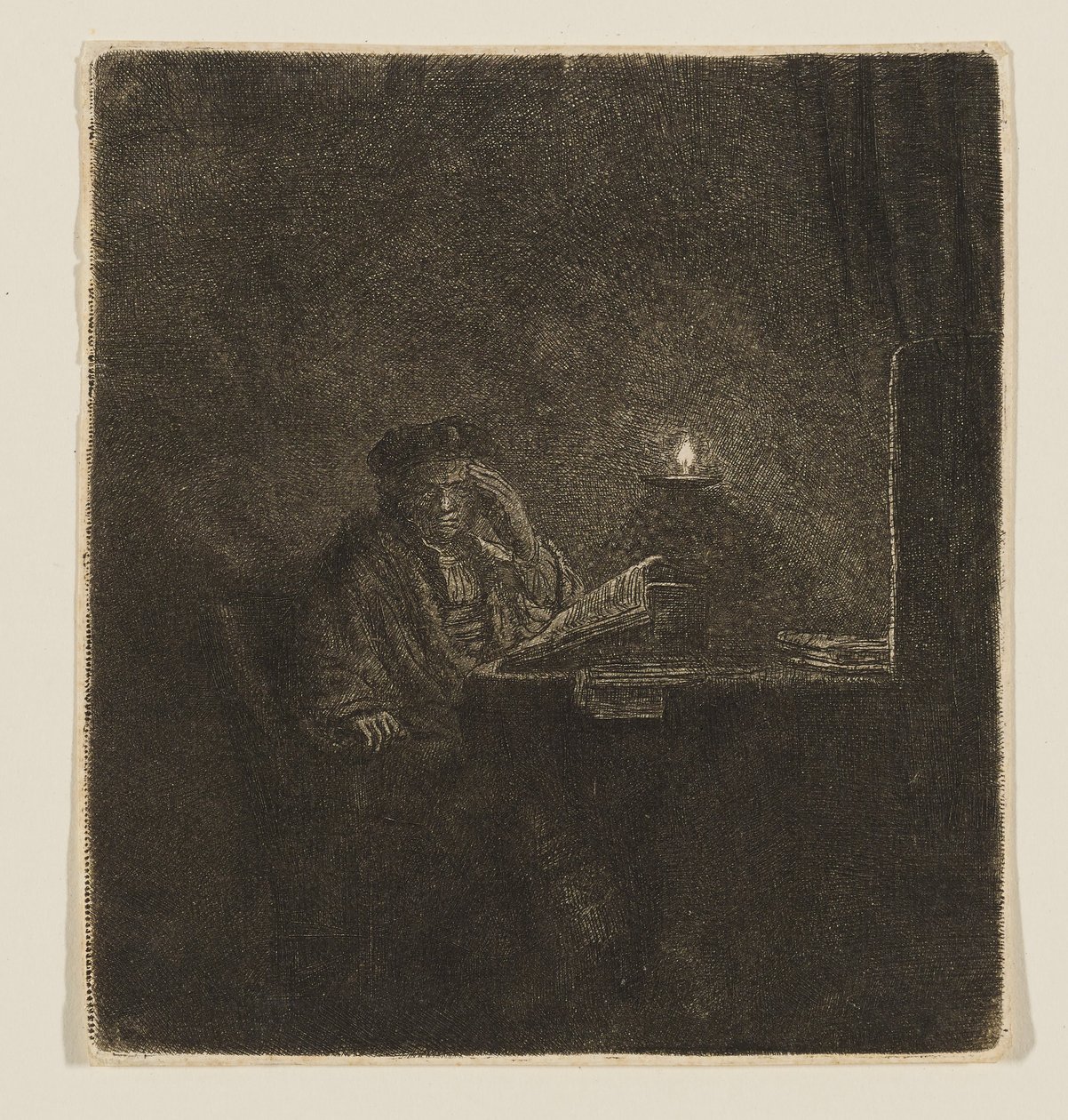 En studerende ved et bord i stearinlysets skær af Rembrandt van Rijn