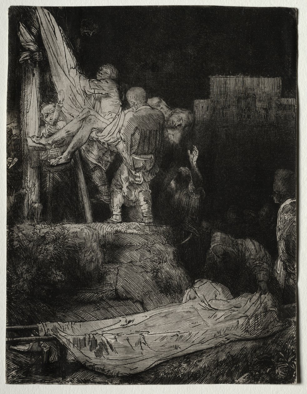 Nedstigningen fra korset med fakkellys af Rembrandt van Rijn