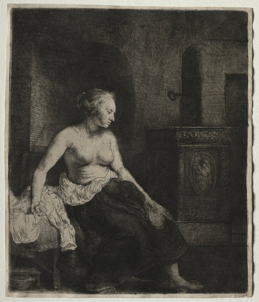 Kvinde, der sidder halvt klædt ved siden af et komfur, 1658. af Rembrandt van Rijn