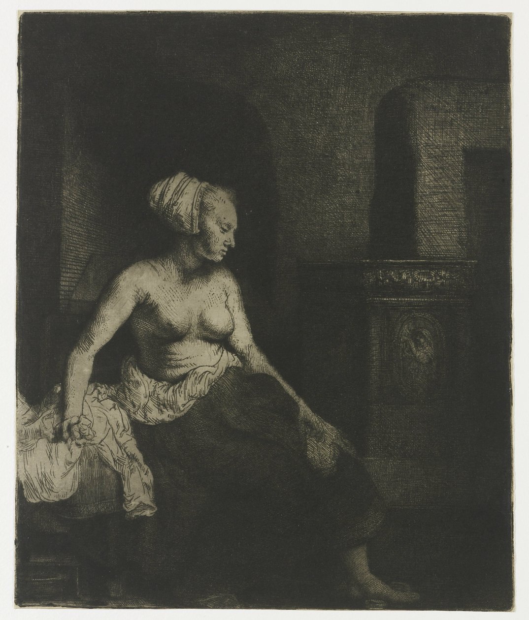Kvinde, der sidder halvt klædt ved siden af et komfur Kvinde sidder halvt påklædt ved siden af et komfur af Rembrandt van Rijn