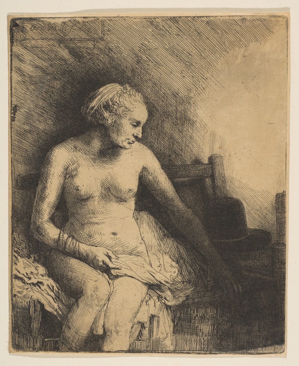Kvinde ved badet med en hat ved siden af hende, 1658. af Rembrandt van Rijn