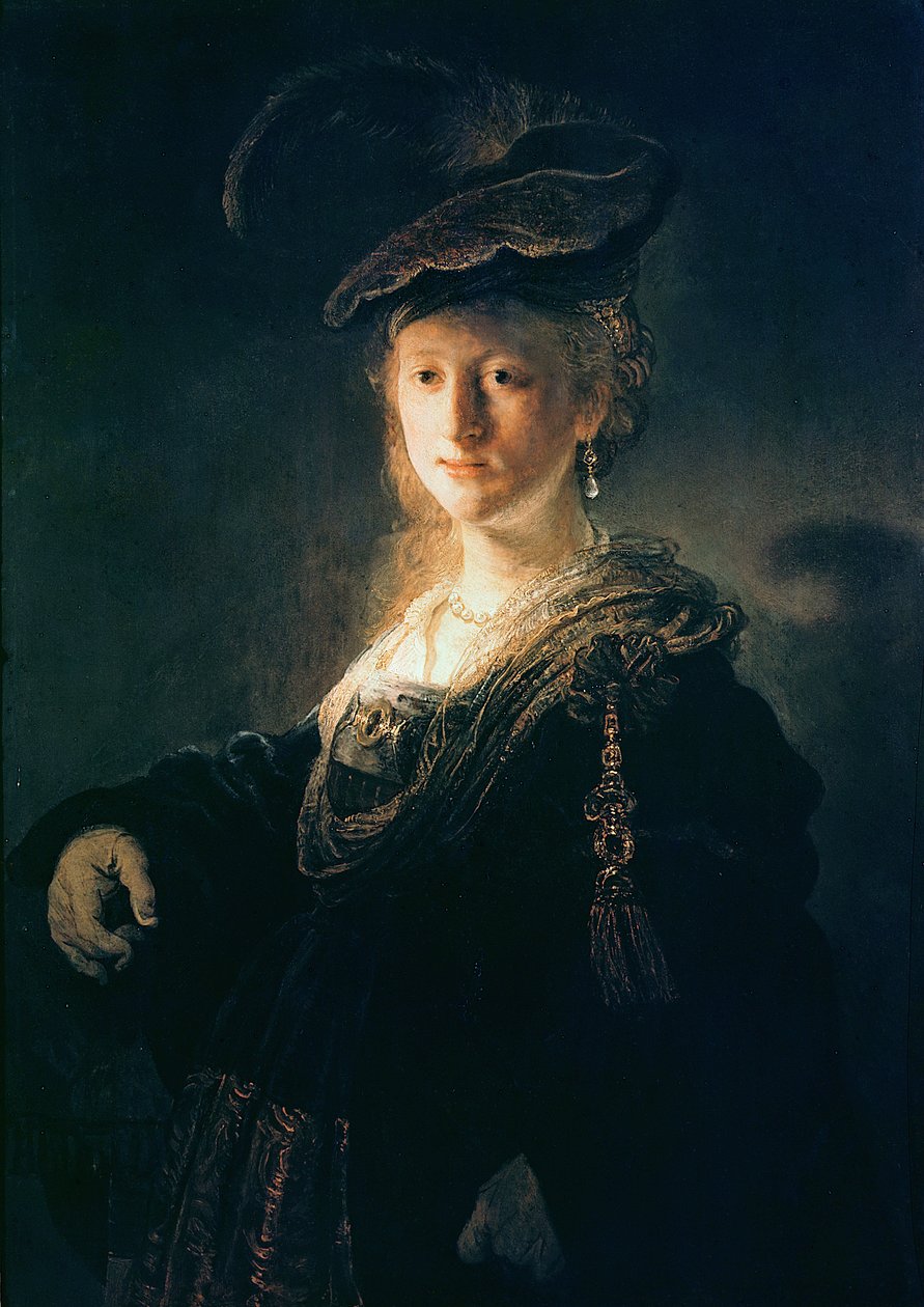 Ung kvinde i fancy kjole af Rembrandt van Rijn