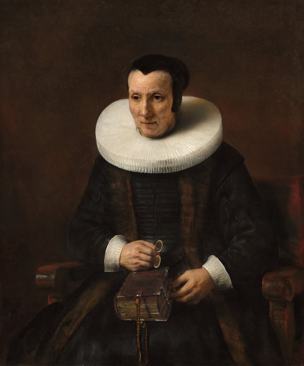 En gammel dame med en bog af Rembrandt van Rijn and Workshop
