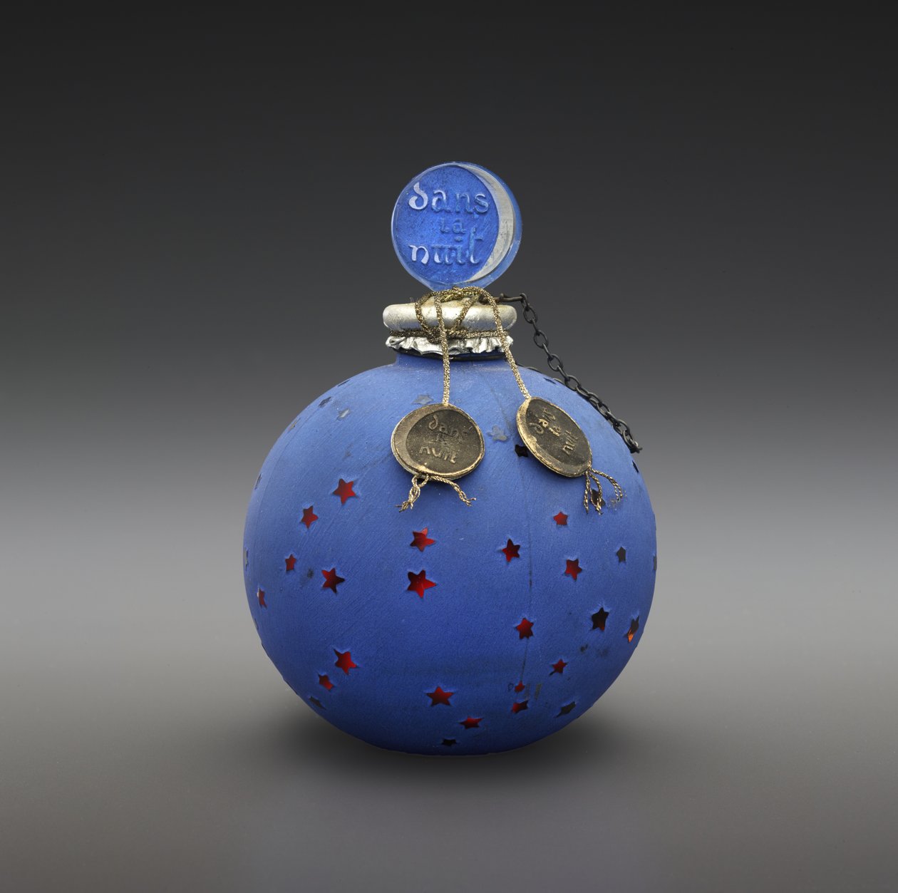 Dans la Nuit, flaske designet 1924, lavet ca. 1930 (glas, emalje, papir, forgyldt & metallisk tråd) af Rene Jules Lalique