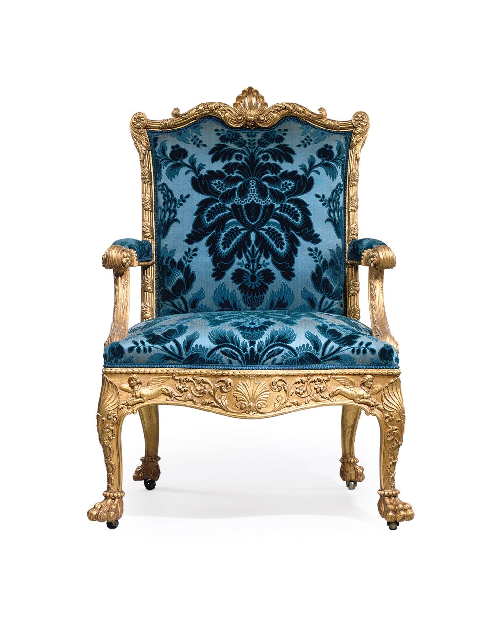 En af et par George III lænestole af forgyldt træ af Robert Adam